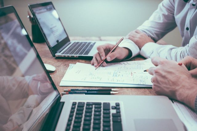 Business owner discussing VAT